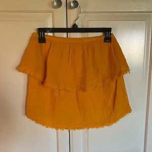 orange shorts and top